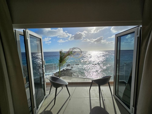 Luxury Oceanfront Living - New Construction Apartments in Secure Gated Community