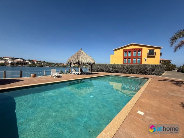 Modern appartement met zwembadzicht in Palapa Resort